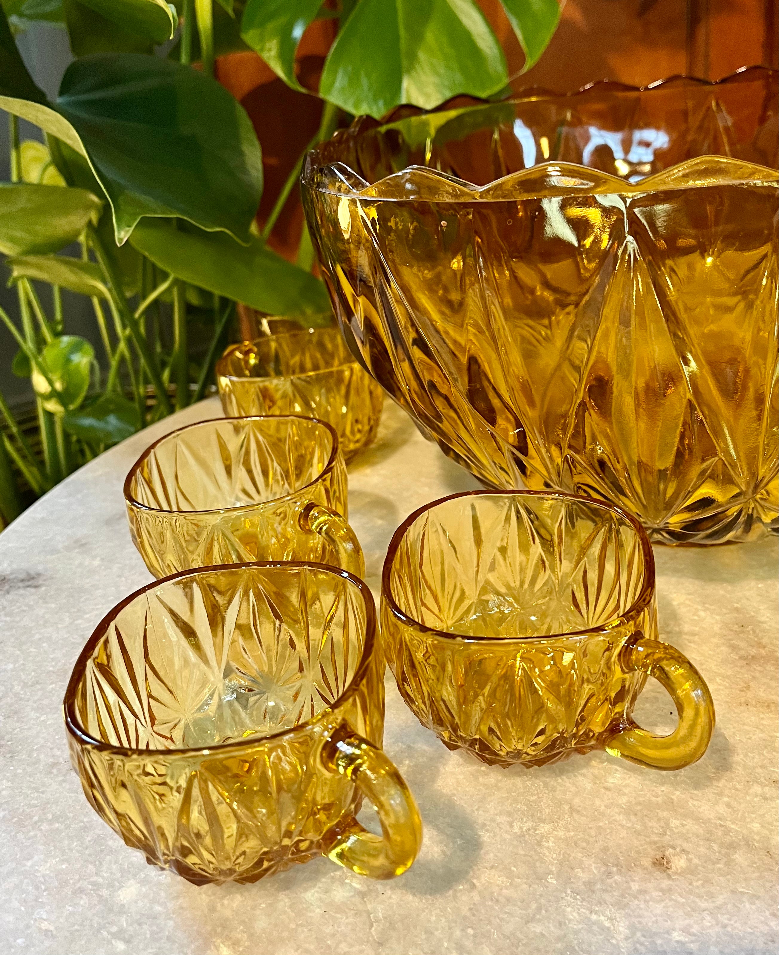 Vintage punch bowl set in amber