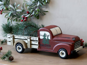 Vintage truck with Christmas tree