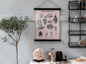 Canvas wall hanging featuring seashells