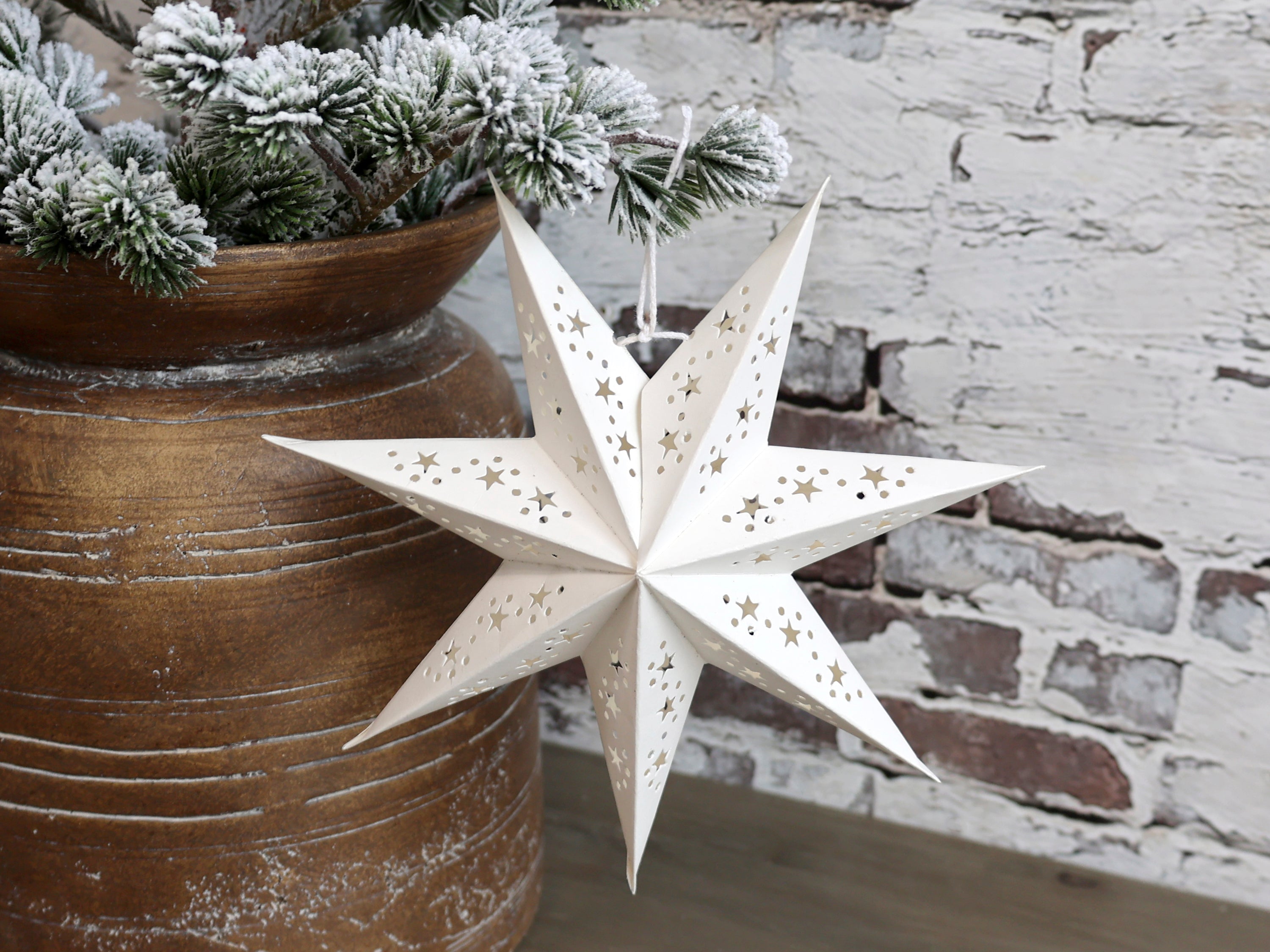 Paper star in white