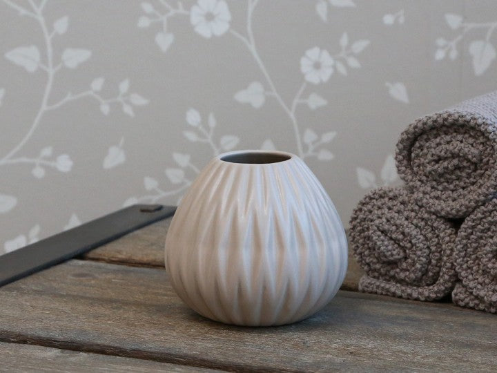 Ceramic pot in latte