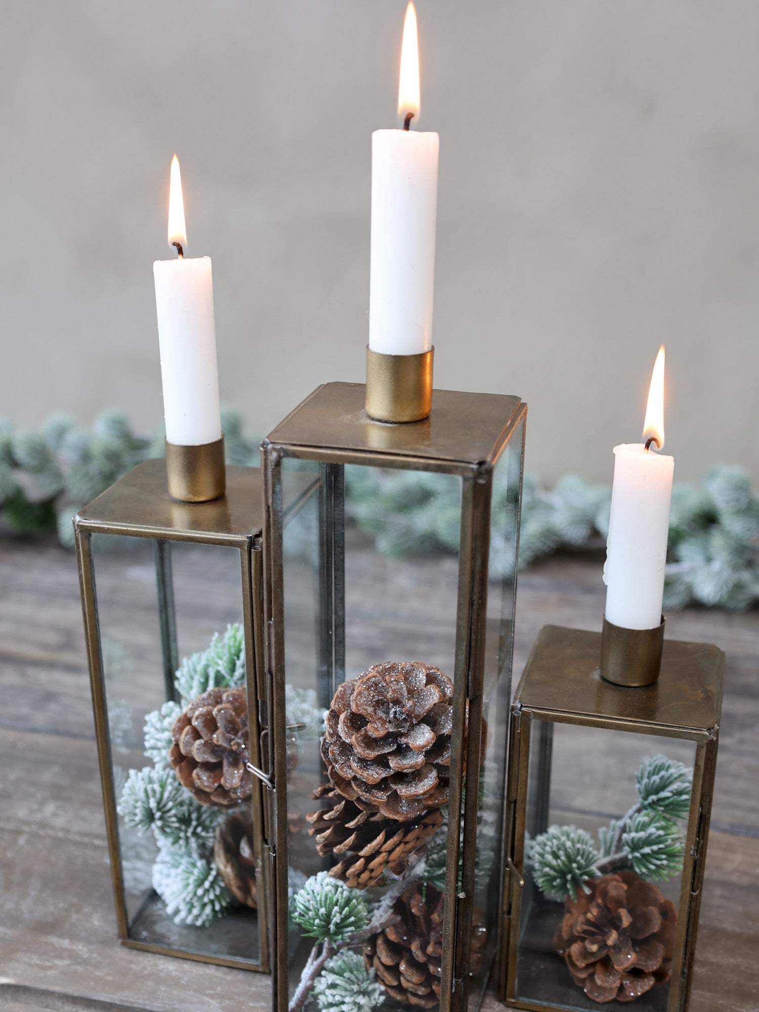 Glass and brass candlestick holder