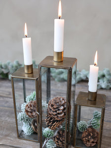 Glass and brass candlestick holder