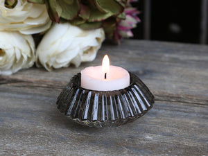 Candlestick for tealights and dinner candles