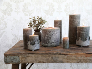 Rustic pillar candle in olive